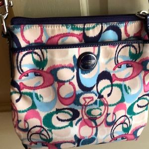 Coach multi color swing pack crossbody bag.